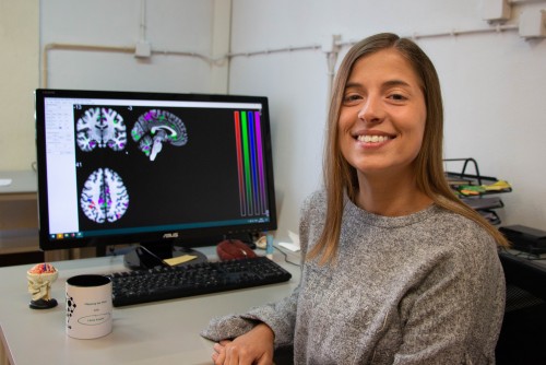 Overlapping but distinct: Distal connectivity dissociates hand and tool processing networks